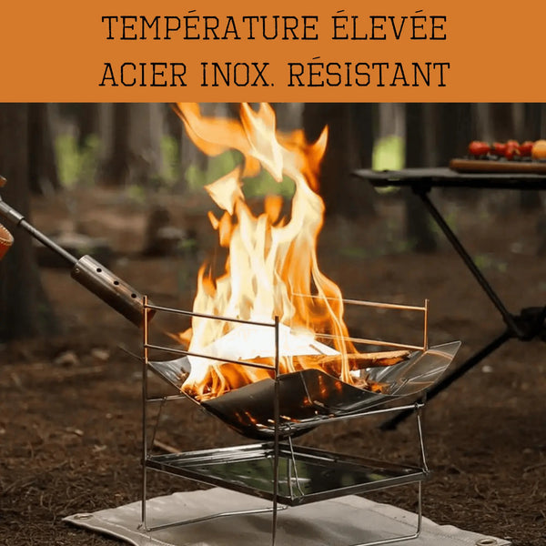 Grille de camp en acier inoxydable pliable en cours d'utilisation avec de grandes flammes, parfaite pour cuisiner en camping.