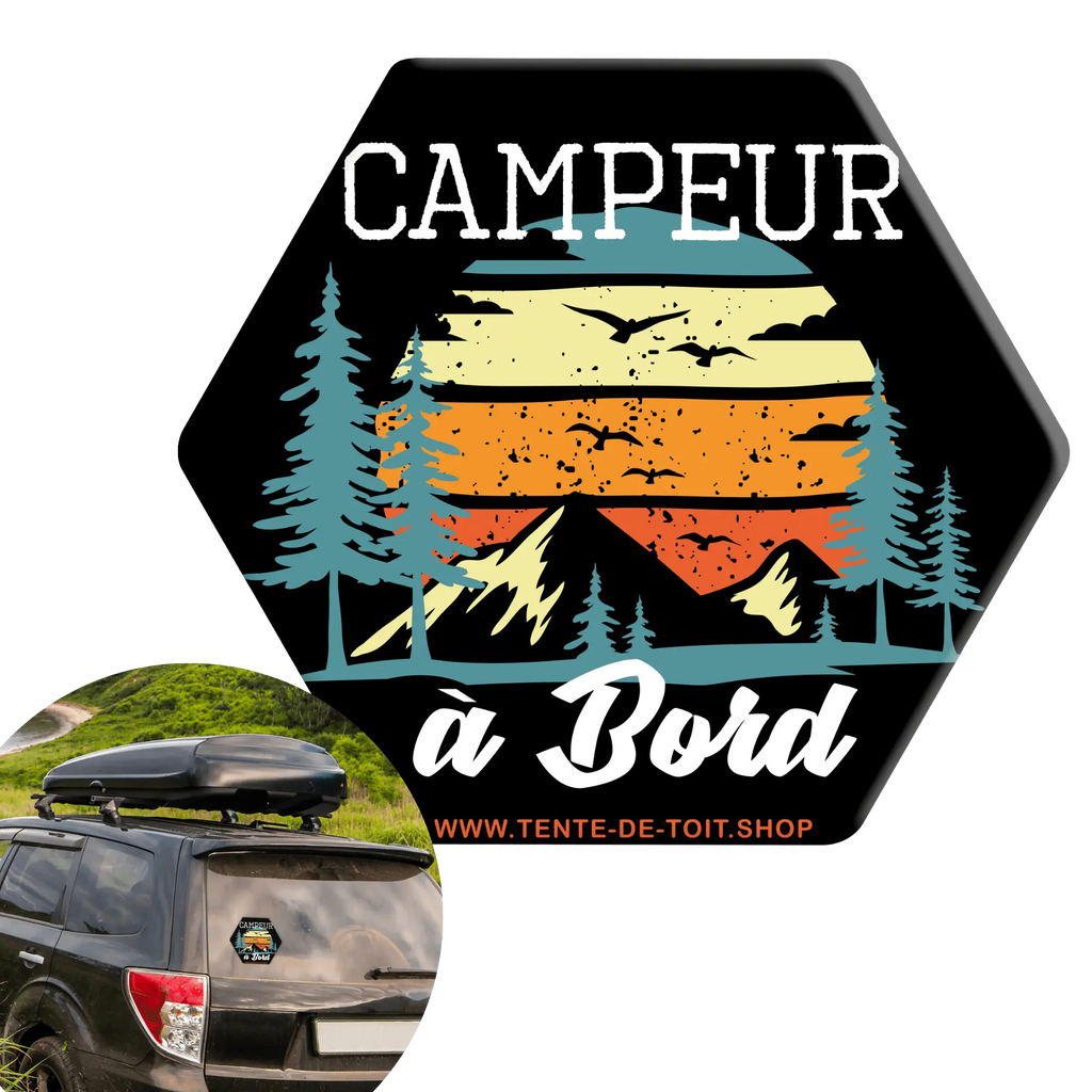 Autocollant "Campeur à Bord" avec un design pittoresque sur une voiture, idéal pour les passionnés de vanlife et de roadtrips, durable et résistant aux intempéries.